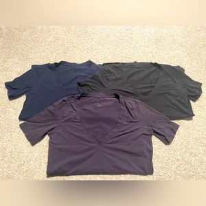 3 LULULEMON V-neck tshirts.  Black, purple and navy.  Size 4.